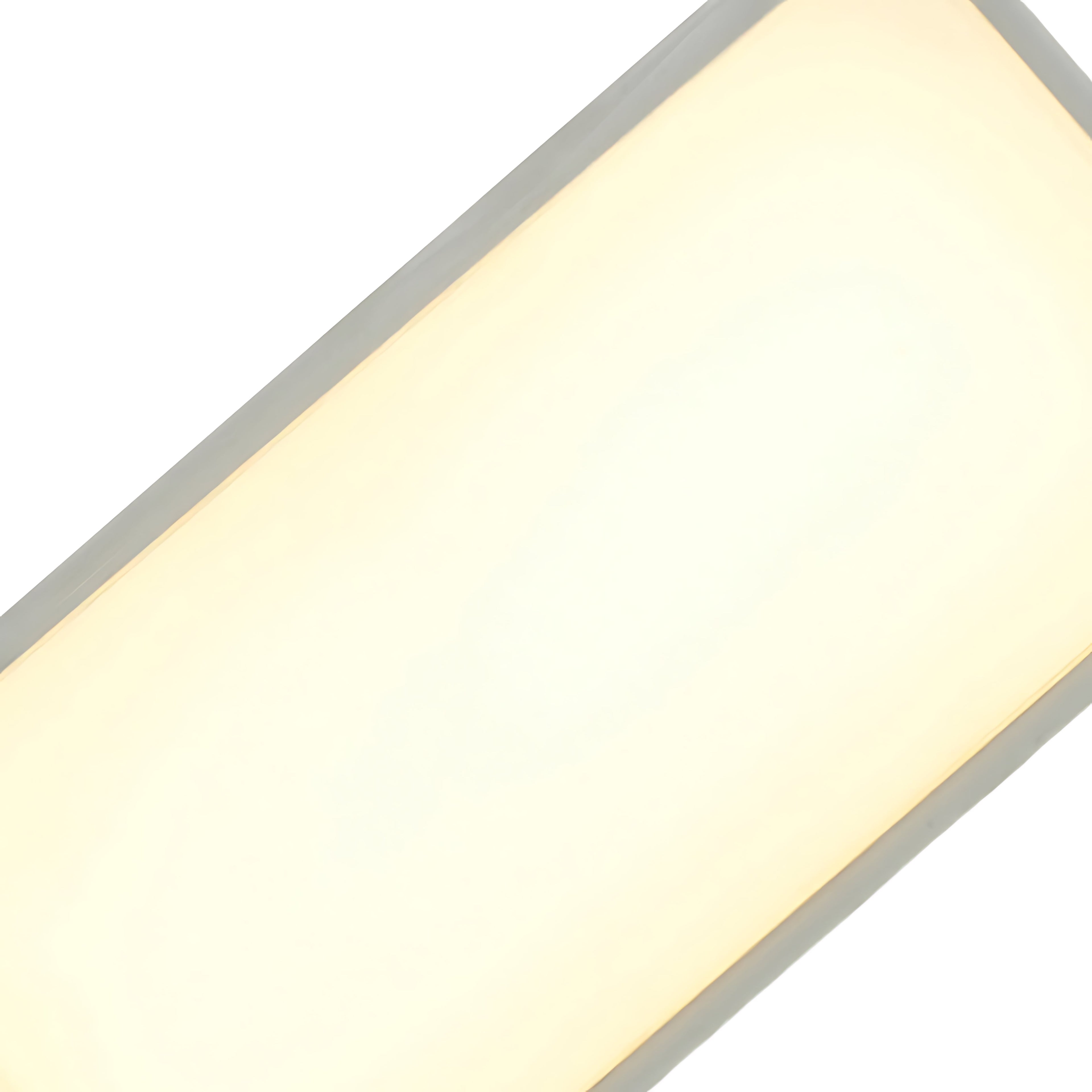 Close-up detail of LED panel showing warm white light output and quality construction