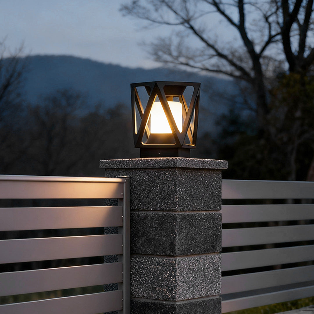 Single led pillar light mounted on a stone pillar, providing warm ambient lighting in a residential outdoor setting.