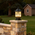 LED pillar lights illuminating a modern garden pathway with warm directional glow.