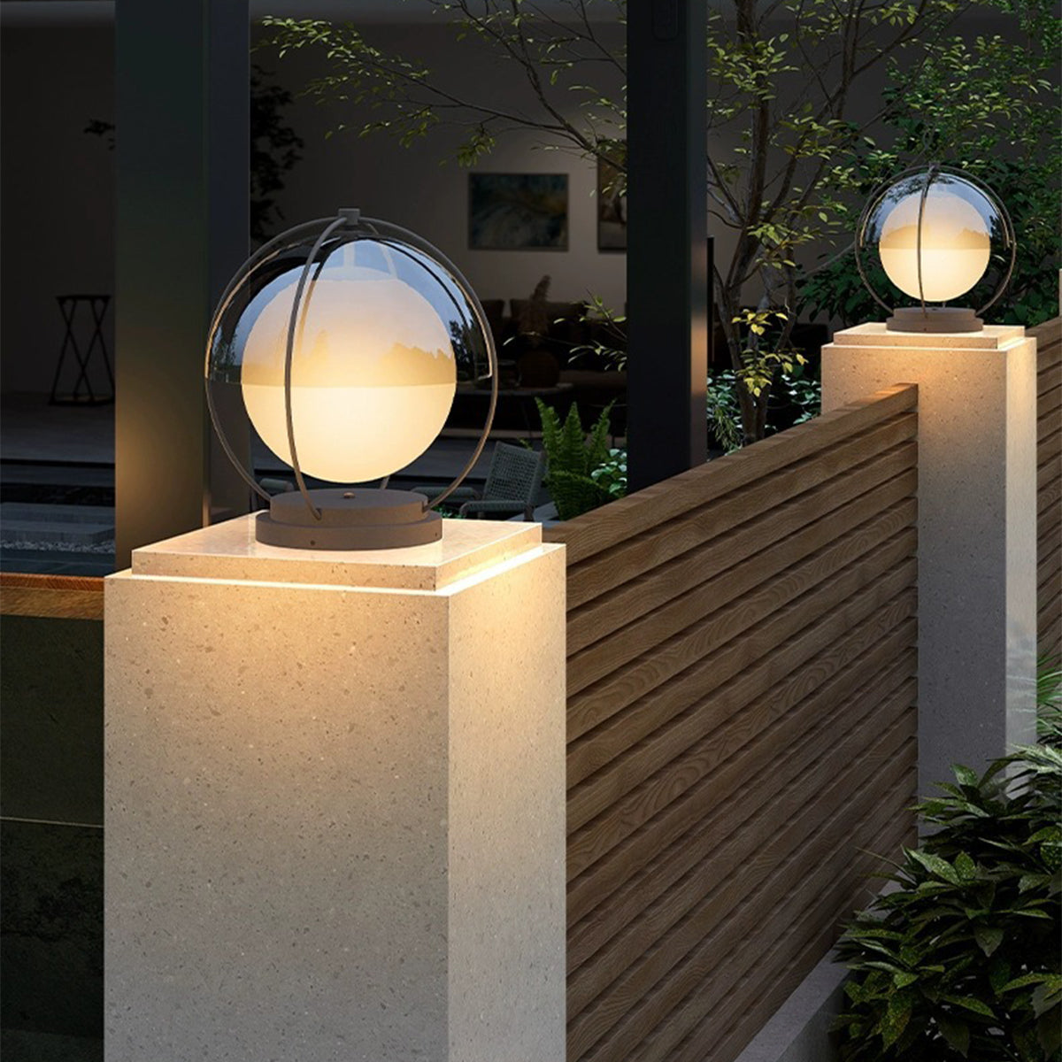 Outdoor led pillar lights mounted on square stone posts creating warm and welcoming courtyard lighting