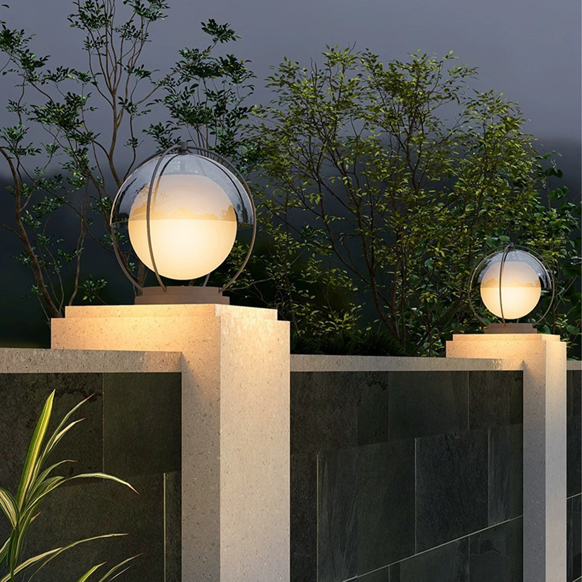 Minimalist led pillar lights outdoor placed on concrete fence posts with frosted globe emitting warm exterior light
