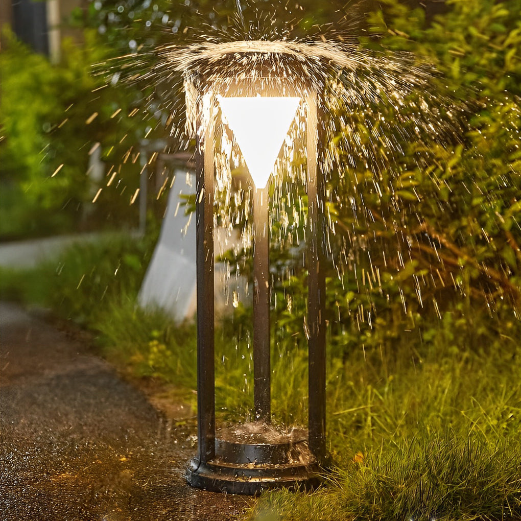 LED solar bollard lights with a close-up of the illuminated light fixture.
