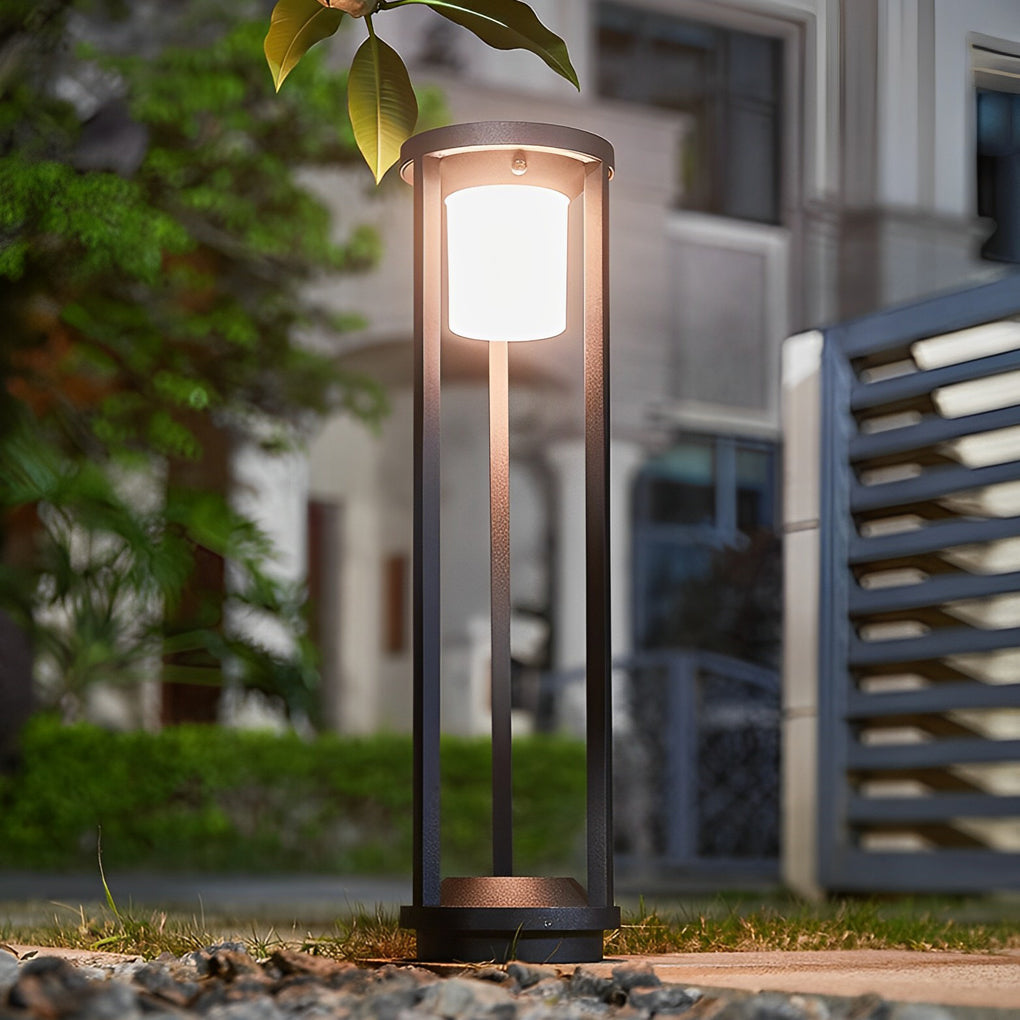 LED solar bollard lights illuminating a contemporary outdoor space with minimalist design.