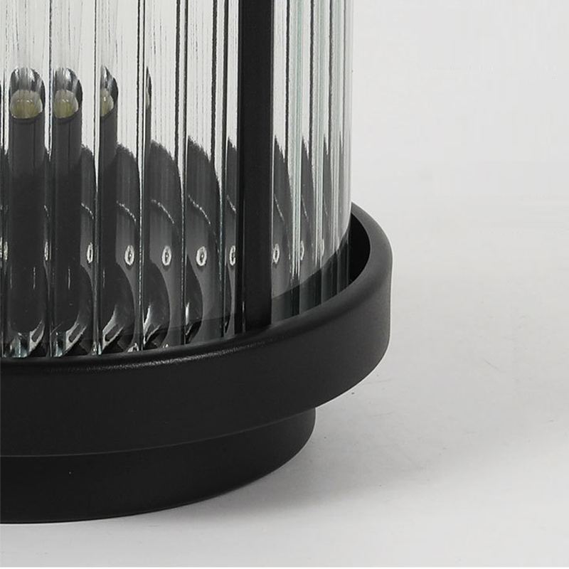 Top view of an LED solar lanterns outdoor, highlighting its black top and clear glass design.