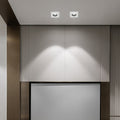 LED spotlights bulbs installed in a modern living room ceiling, providing focused illumination.