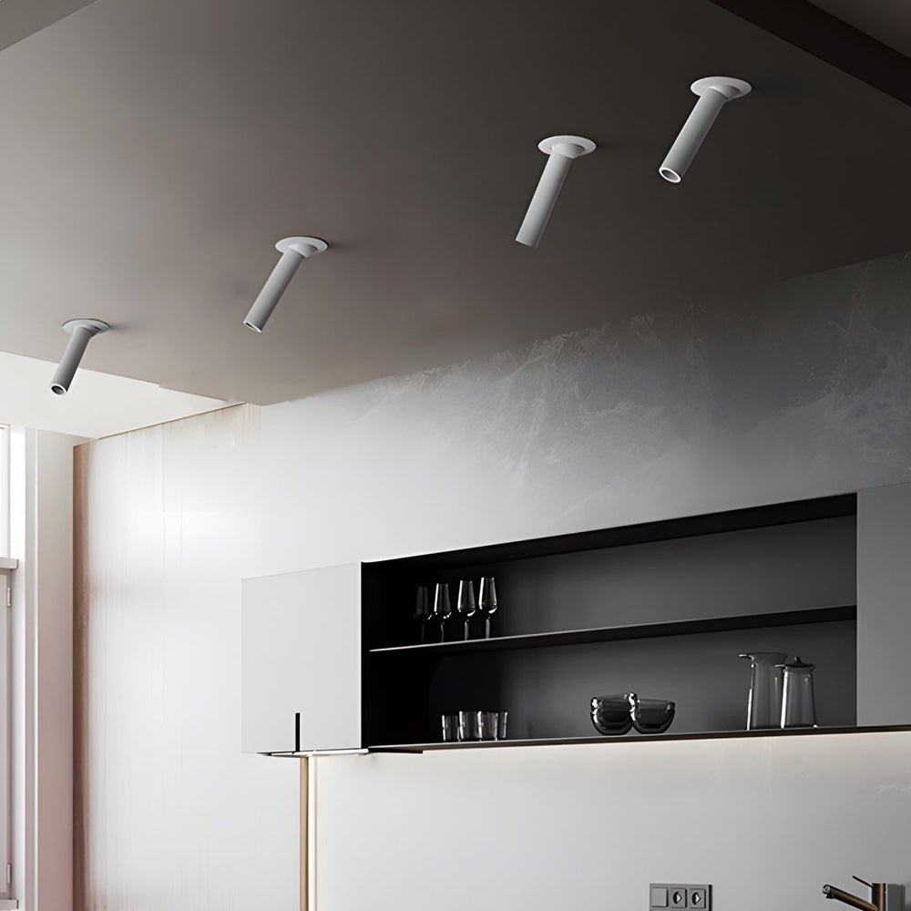 LED surface spotlights above a kitchen counter, offering bright and focused task lighting in a modern home.