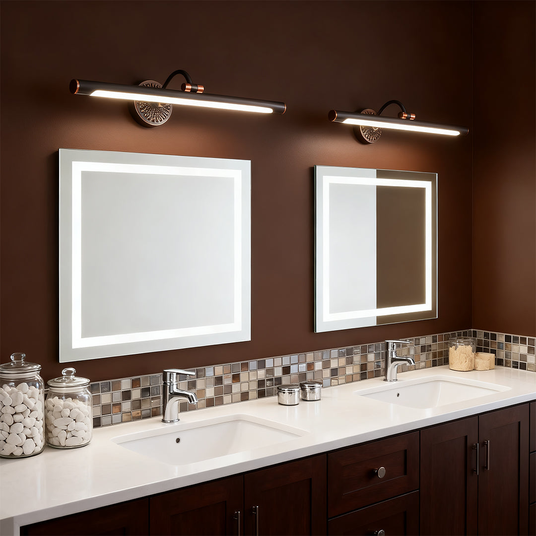 LED vanity bathroom lights with a brass finish, positioned above a dresser for functional and decorative lighting.