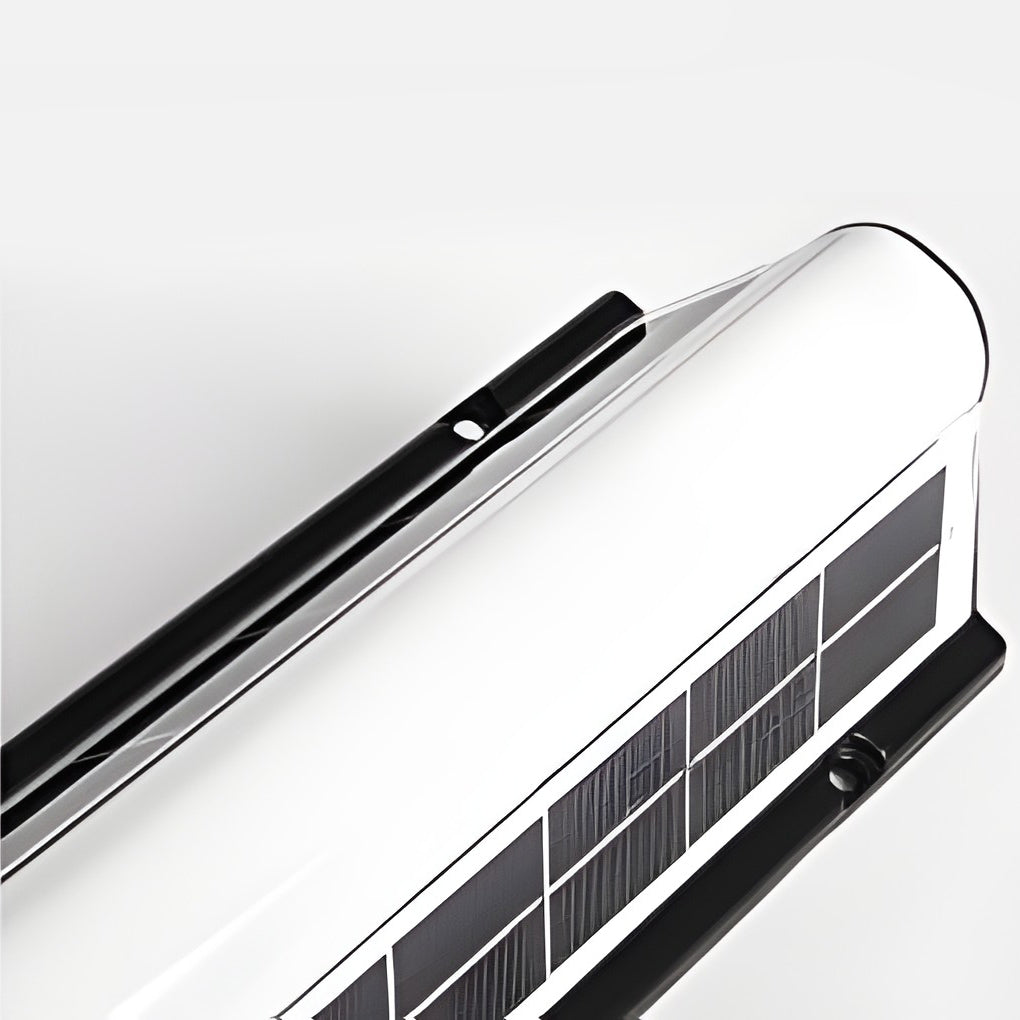 Close-up of LED wall solar light showing solar panel and light diffusion.