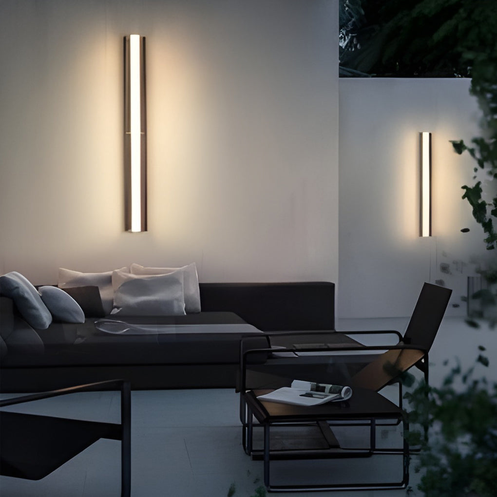Pair of LED wall solar lights installed above outdoor seating, providing ambient lighting.