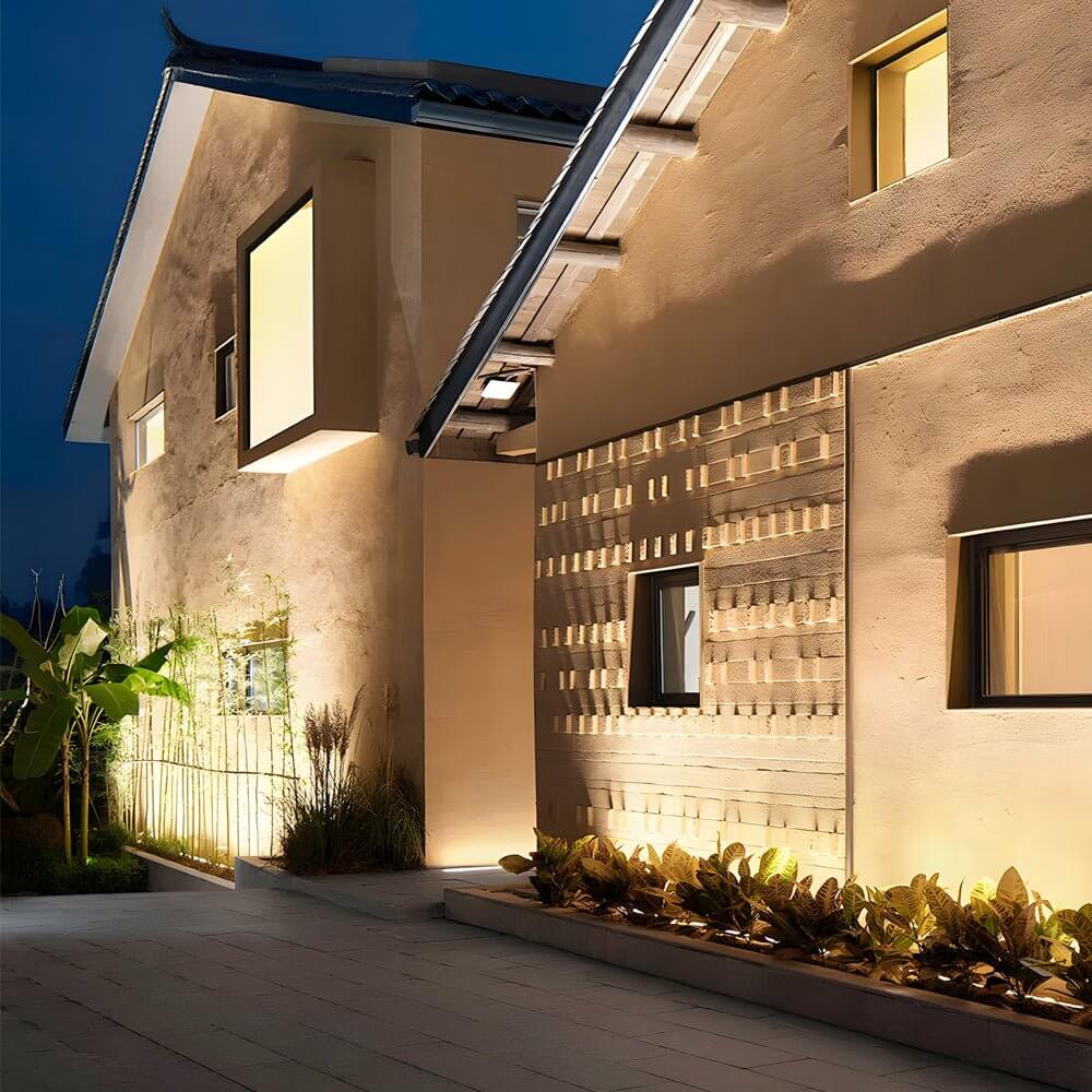 LED wall washer light enhancing the exterior of a residential house with soft and even lighting.