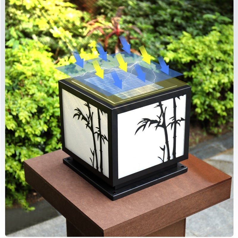 Light box pillar lights with a close-up of their solar panel and bamboo design.