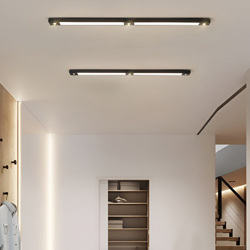 Minimalist linear ceiling pendant light in interior hallway