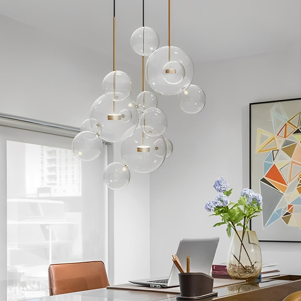 Linear clear bubble chandelier with rectangular ceiling canopy.