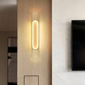 Linear led wall light providing elegant accent lighting in hallway with contemporary decor and dark architectural elements