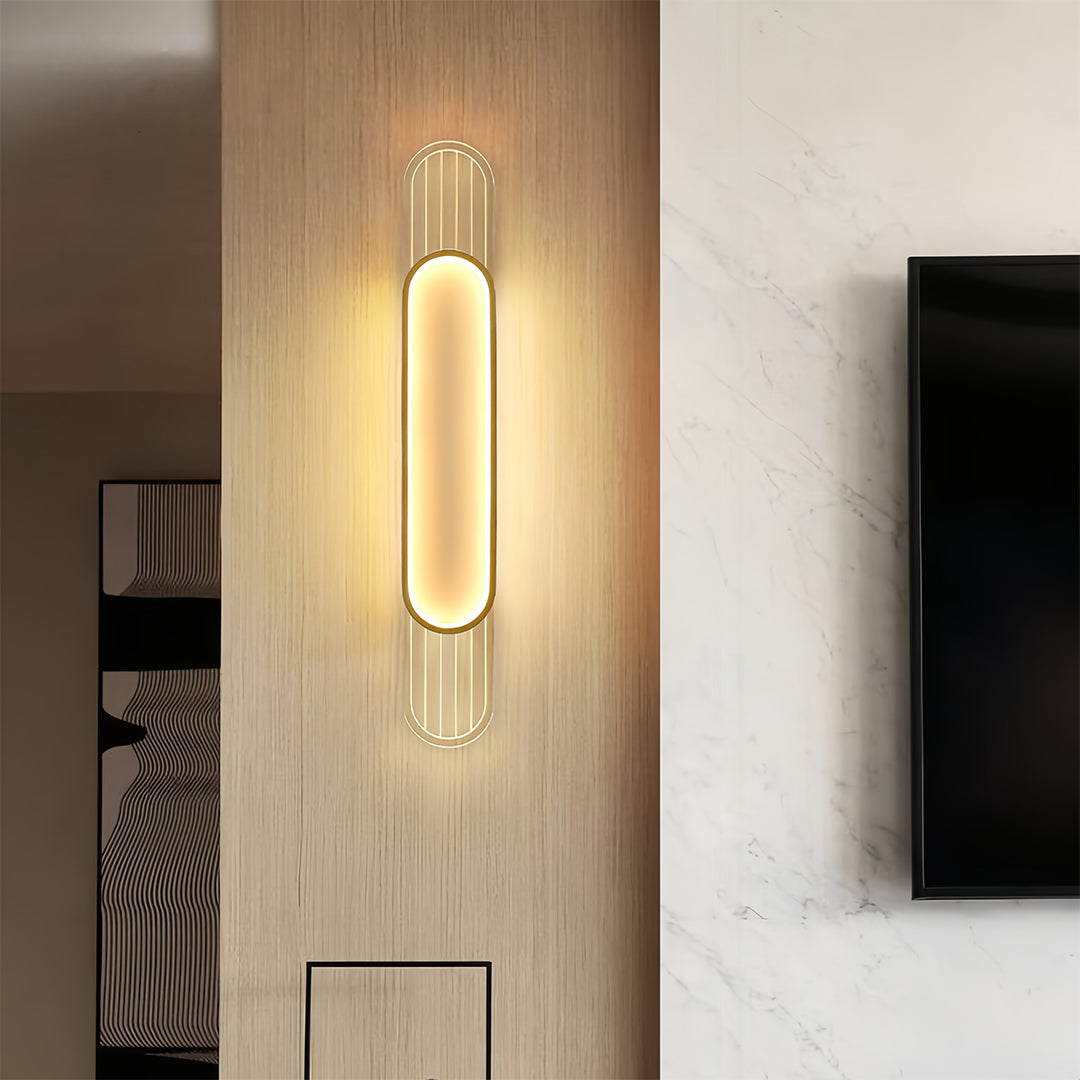 Linear led wall light providing elegant accent lighting in hallway with contemporary decor and dark architectural elements
