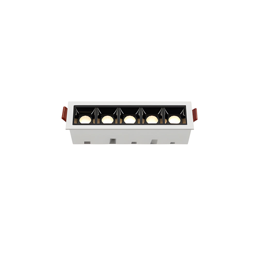 Extended linear recessed ceiling spot light for large-area lighting coverage.