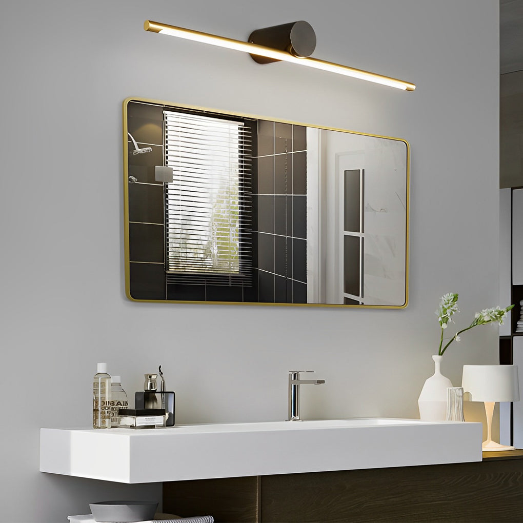 Modern linear vanity light bar with gold accents above bathroom sink