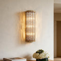 Enhance your interior with linear wall light with gold vertical crystal rods, featuring elegant design and energy-efficient LED illumination.