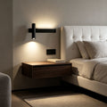 Modern linear wall sconces installed beside a bed with warm ambient lighting in a minimalist bedroom.