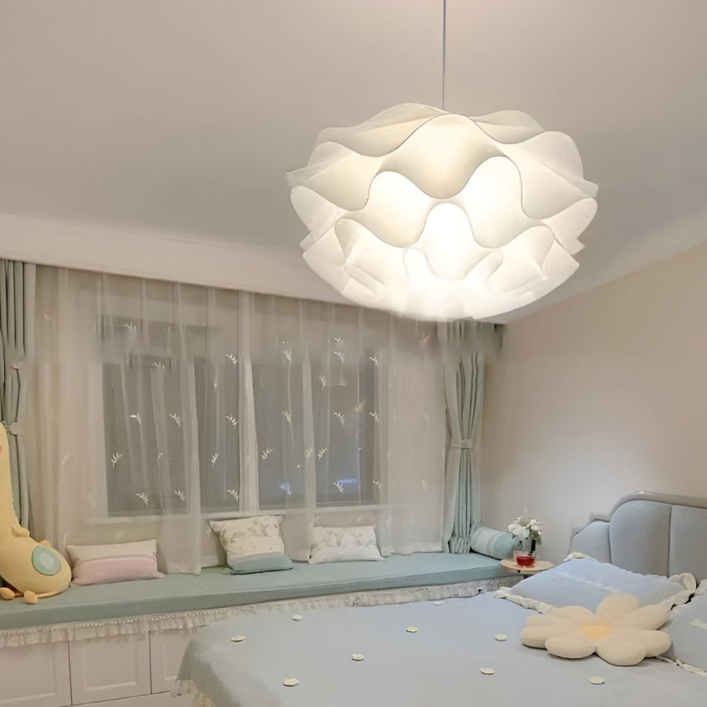 Lotus flower pendant light providing soft light above a dining table.