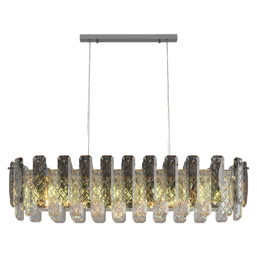 Luxury contemporary crystal chandeliers above contemporary dining table with luxurious kitchen backdrop.