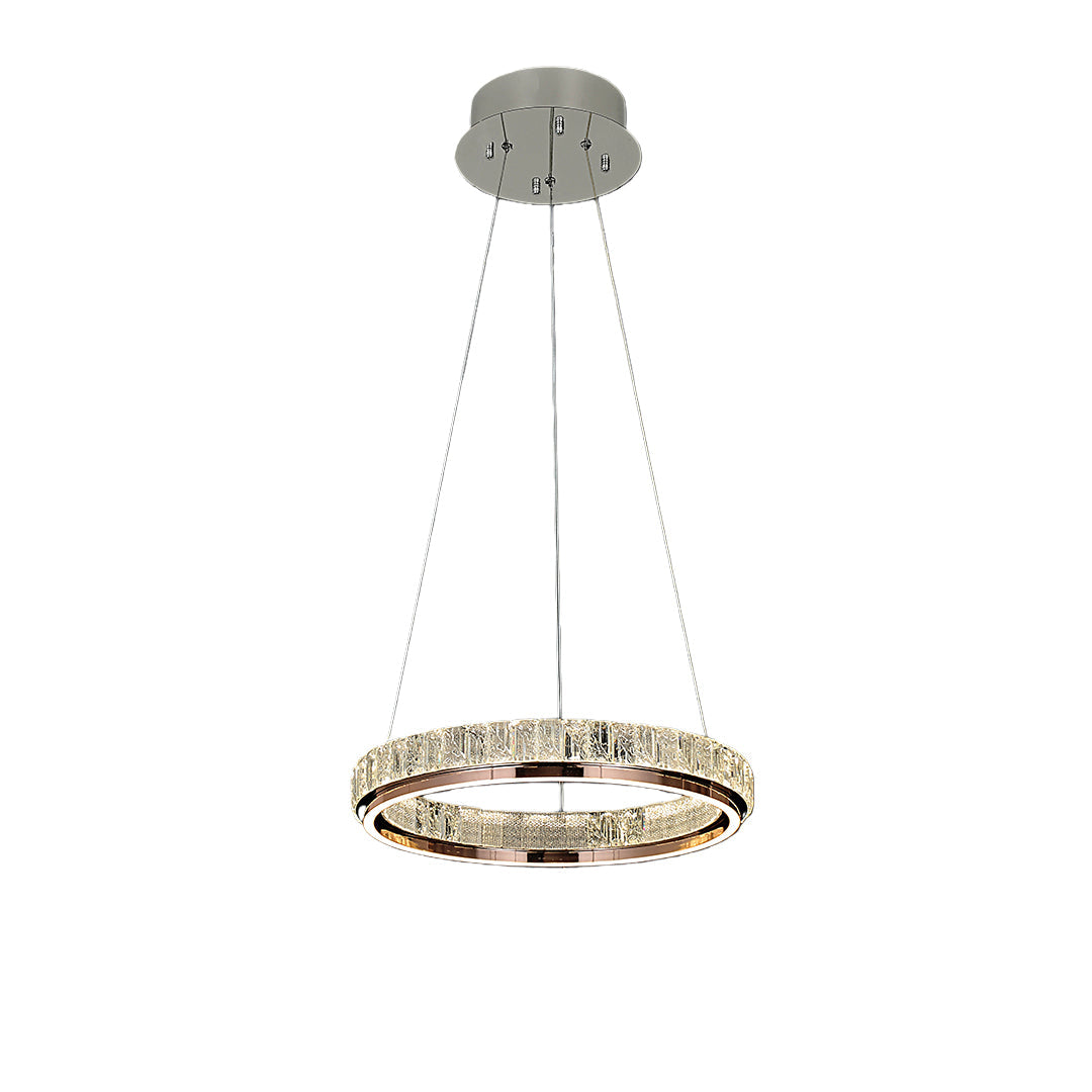 Luxury modern chandelier in a dark-themed living room with plush sofas, creating a cozy yet luxurious atmosphere.