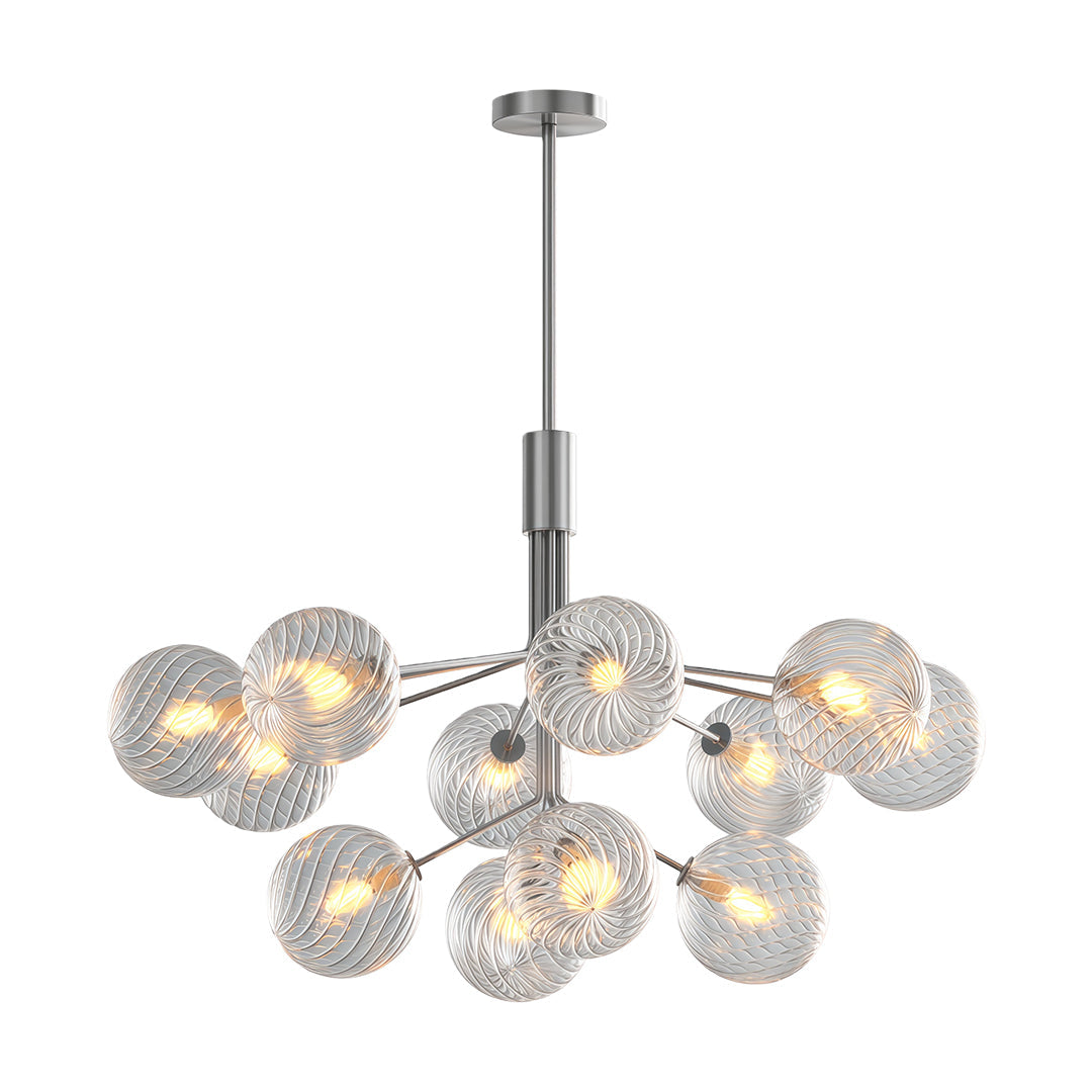 Luxury modern chandeliers with a gold frame, illuminating a dining area with a warm glow.