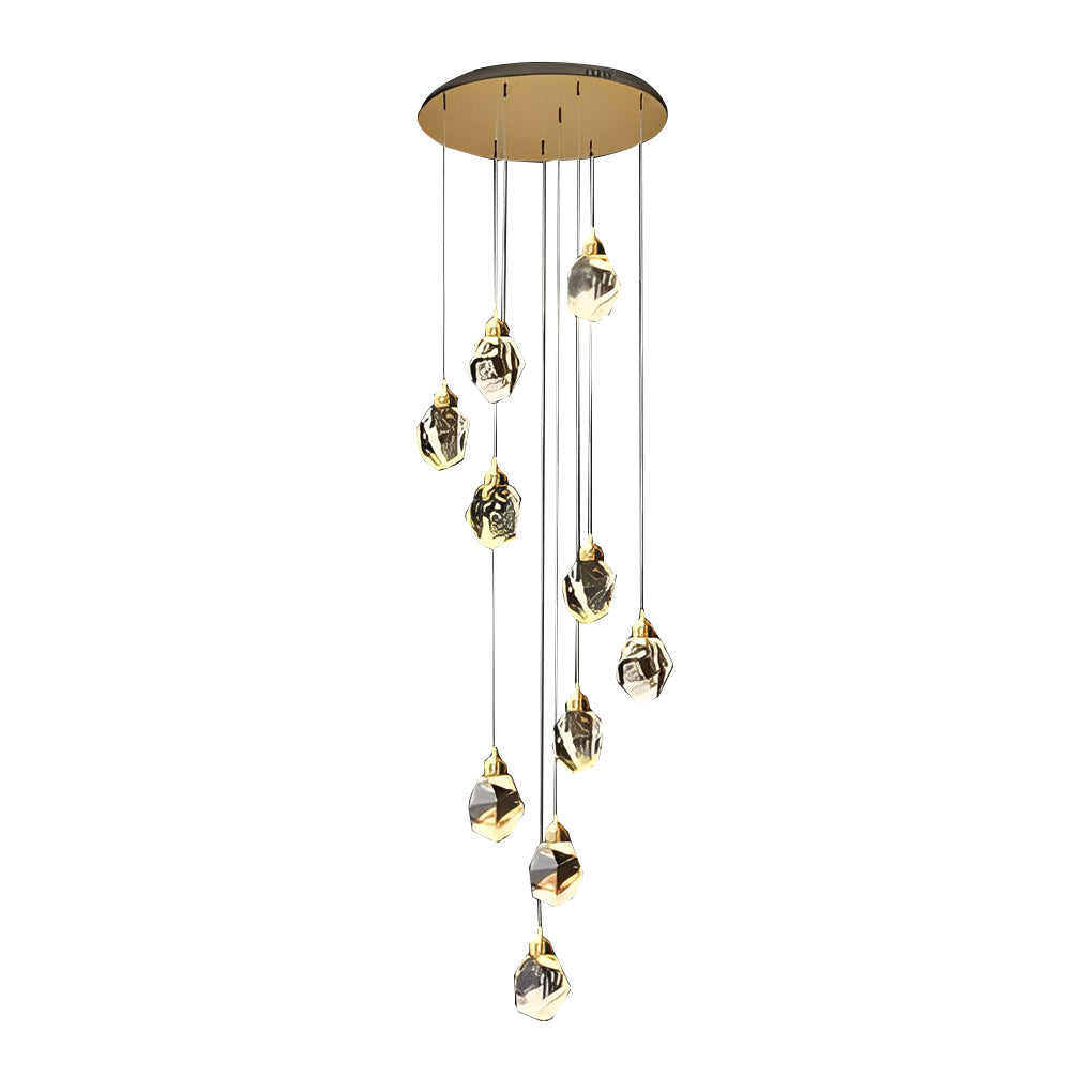 Luxury staircase chandelier featuring geometric crystal shapes, adding a contemporary touch.