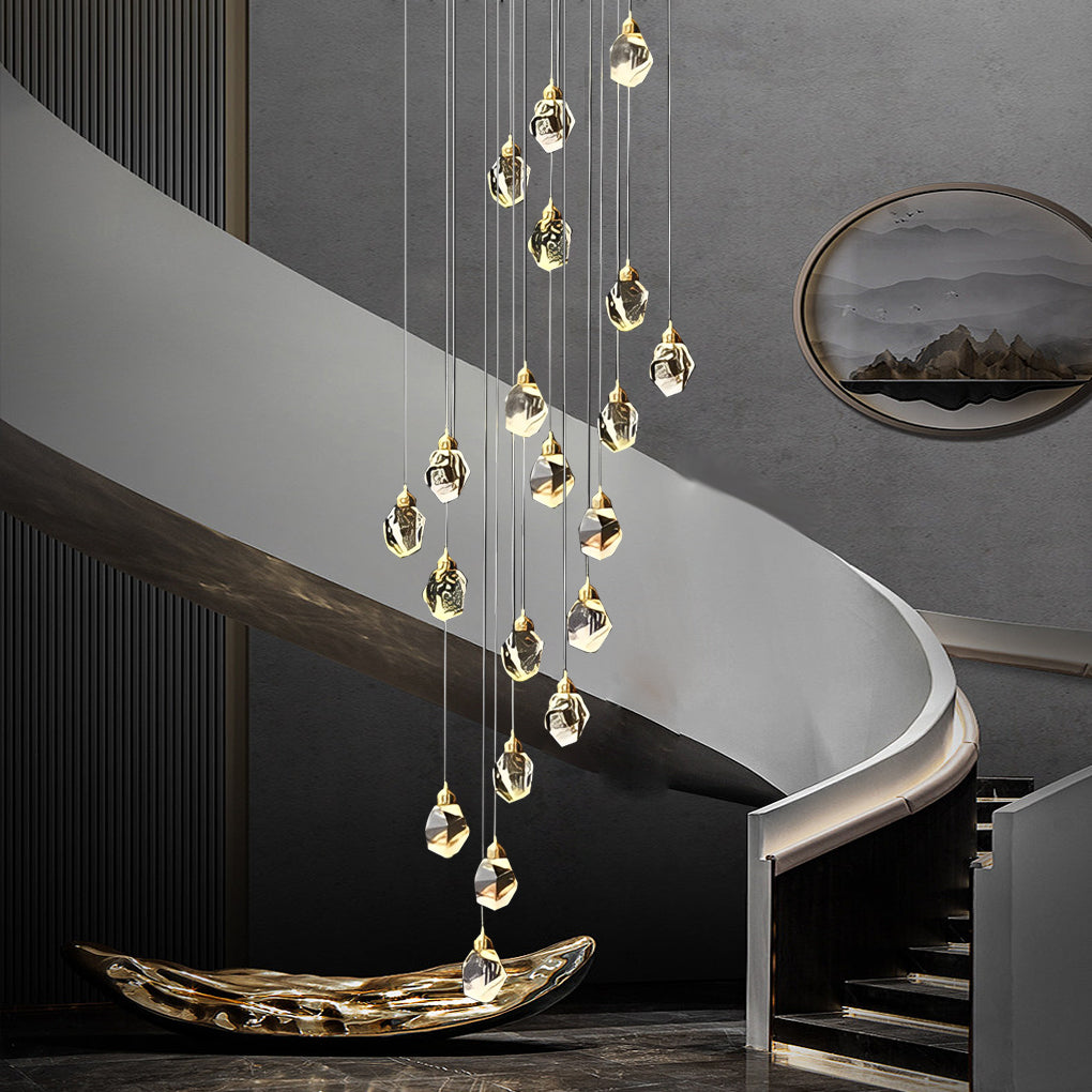 Luxury staircase chandelier casting a warm glow over a marble staircase, creating a grand ambiance.