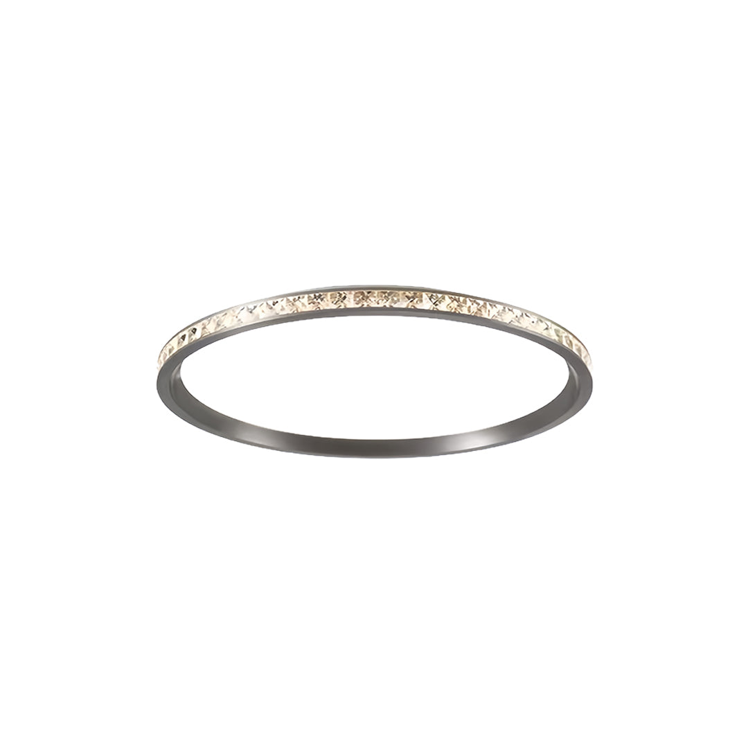 Medium round flush mount LED light with integrated crystal elements and clean circular design