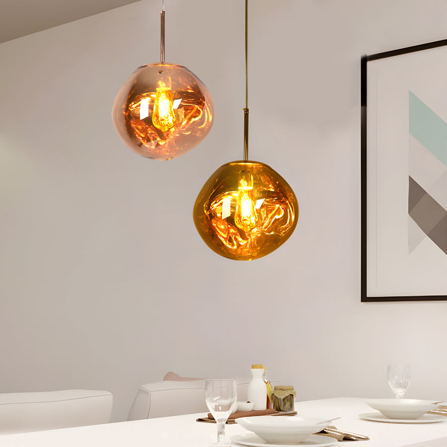 Melt pendant lights installed above a kitchen island
