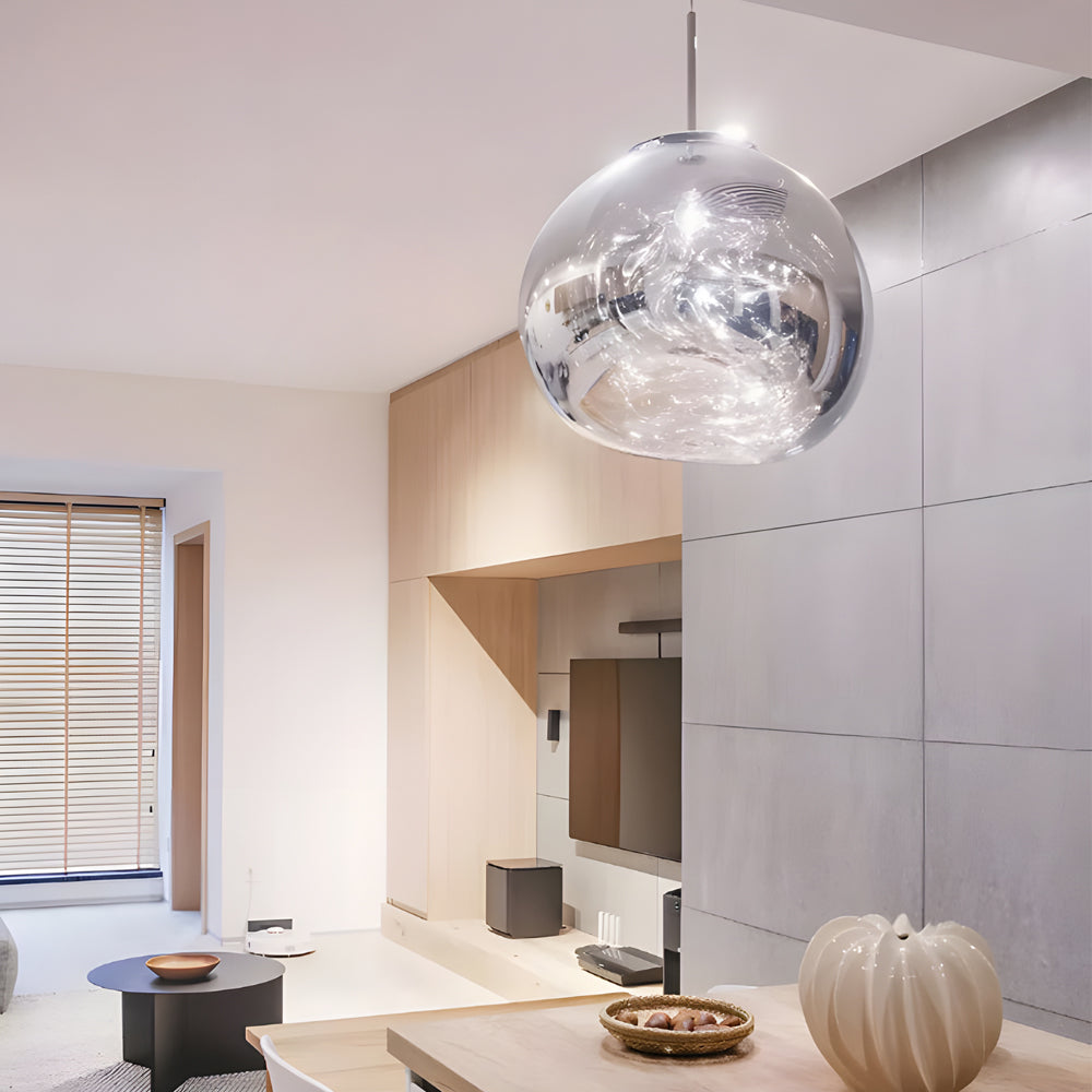 Melt pendant light hanging in a modern open living space