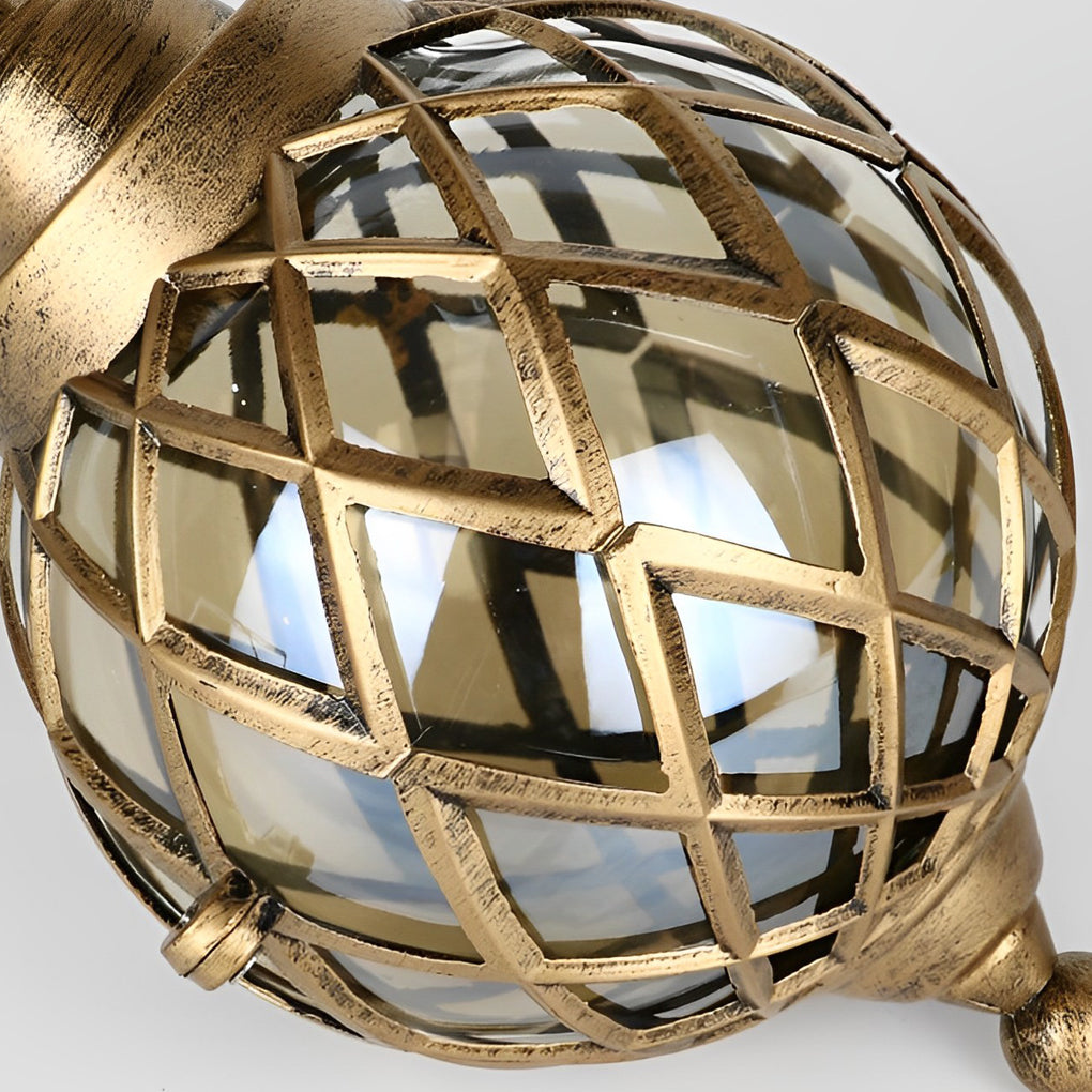 Close-up detail of metal cage globe pendant light with glass diffuser.