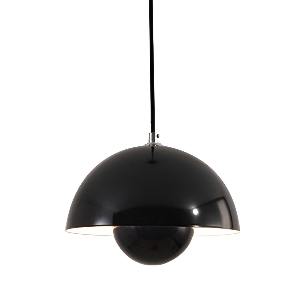 Metal dome pendant light in black, isolated on white background with sleek design.