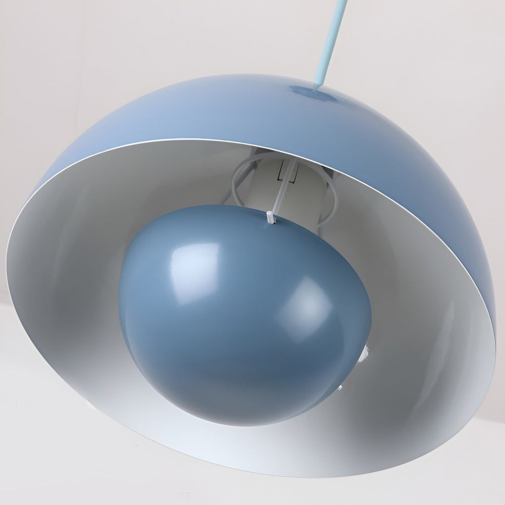 Metal dome pendant light in light blue, close-up of dome shape and smooth finish.