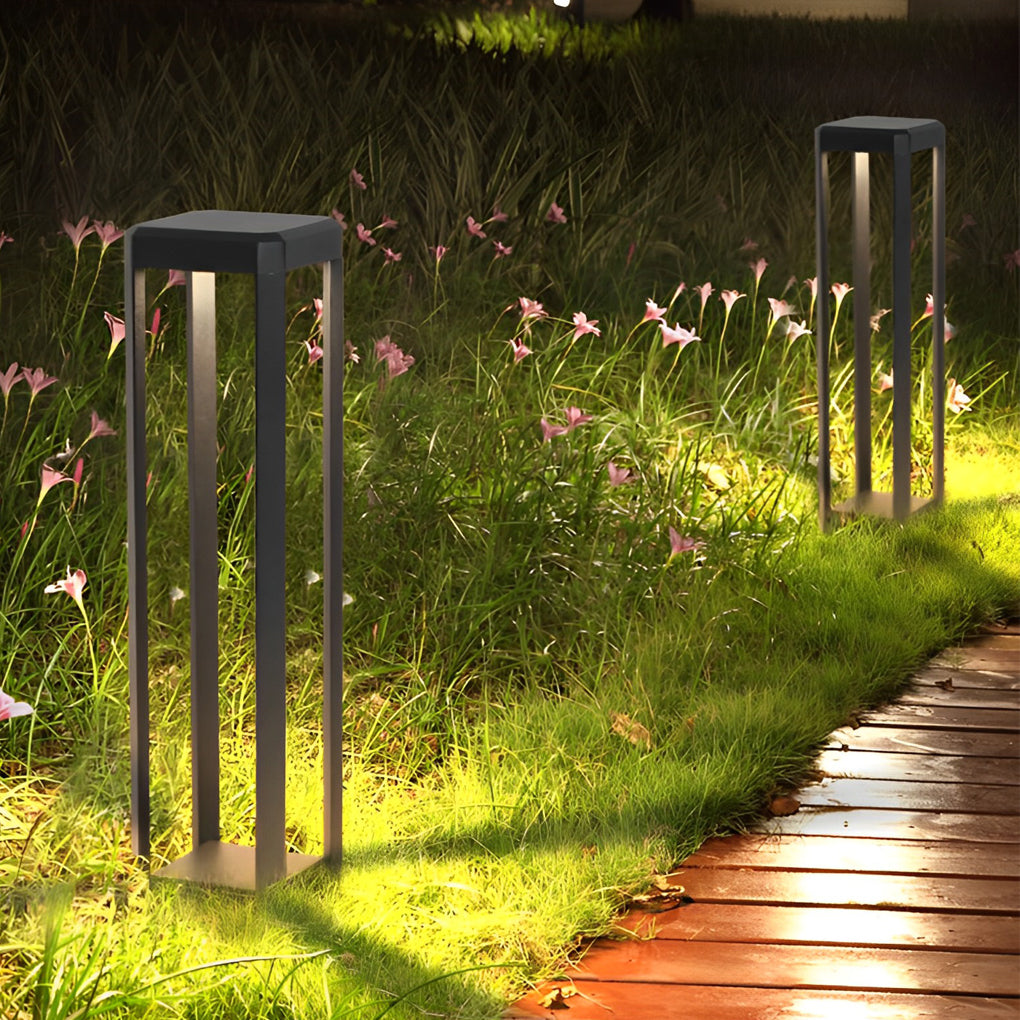 Metal solar pathway lights along a brick pathway, highlighting the modern design and solar efficiency.