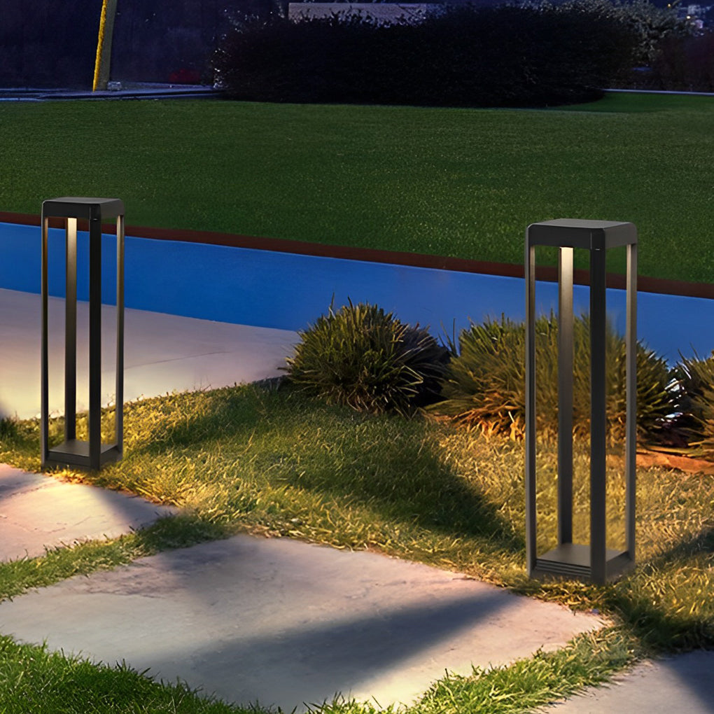 Metal solar pathway lights beside a pool area, adding elegance and functionality to the outdoor space.