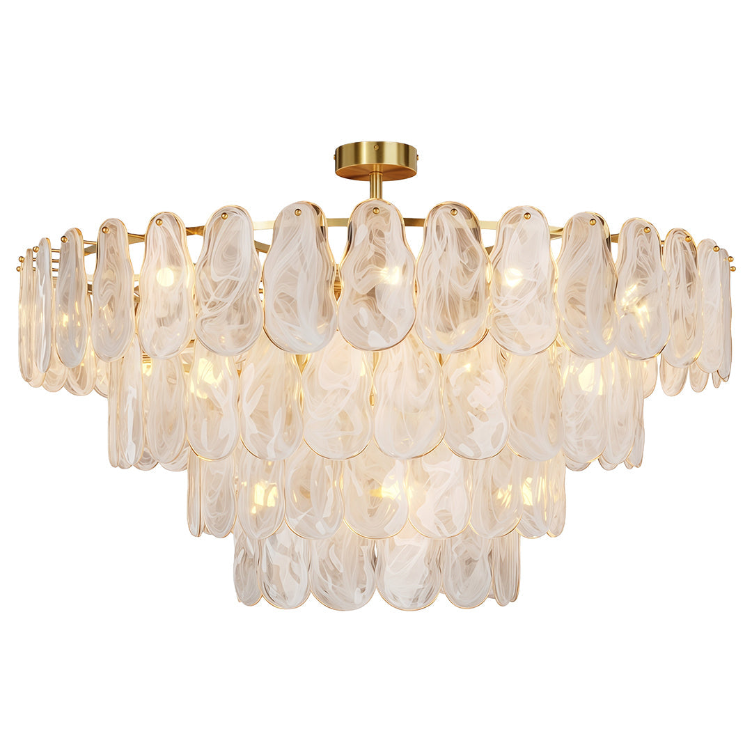 Modern luxury chandeliers close up showcasing brass chain and frosted glass panel detail.