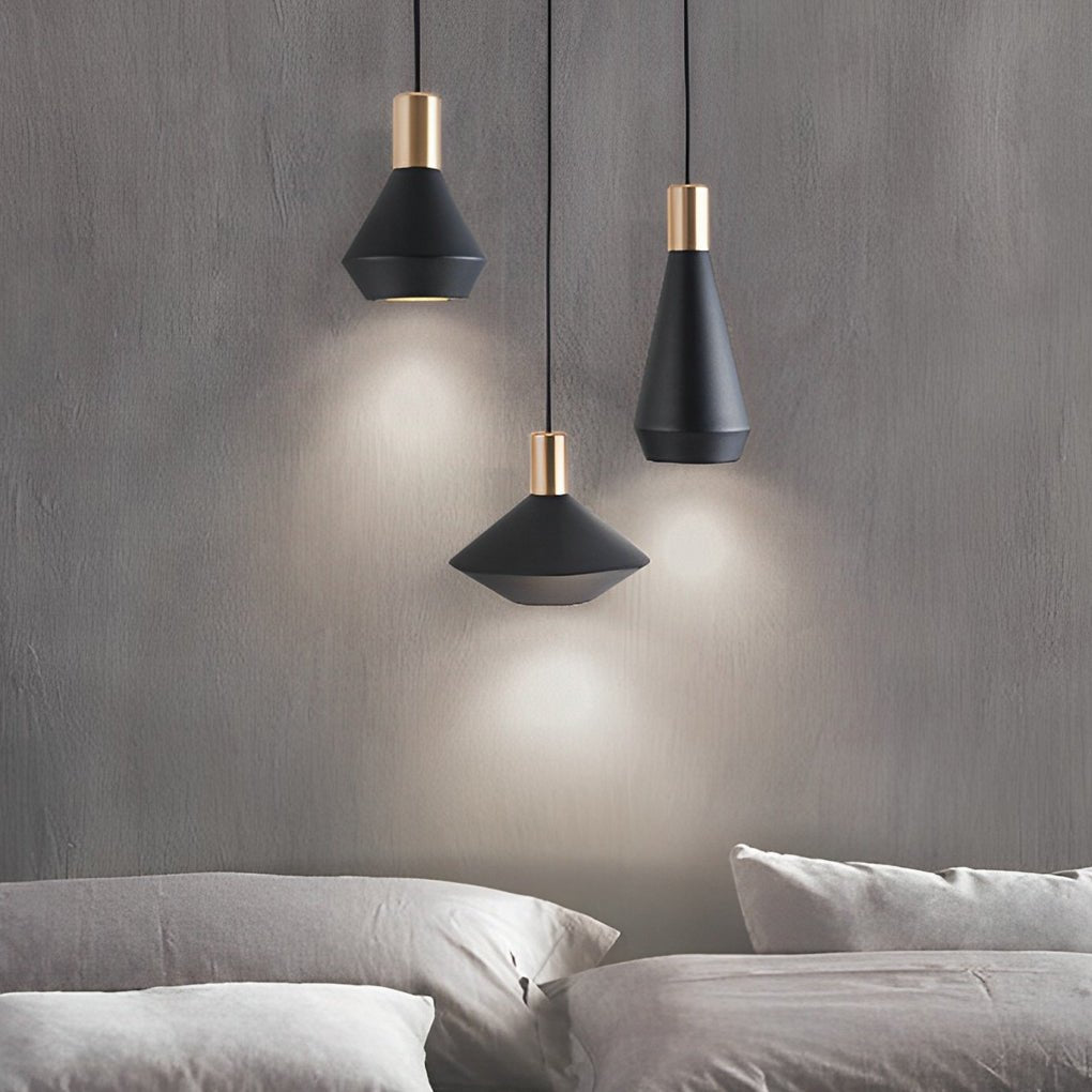 Mini hanging pendant lights grouped above a seating area, delivering elegant ambient lighting in a contemporary interior.