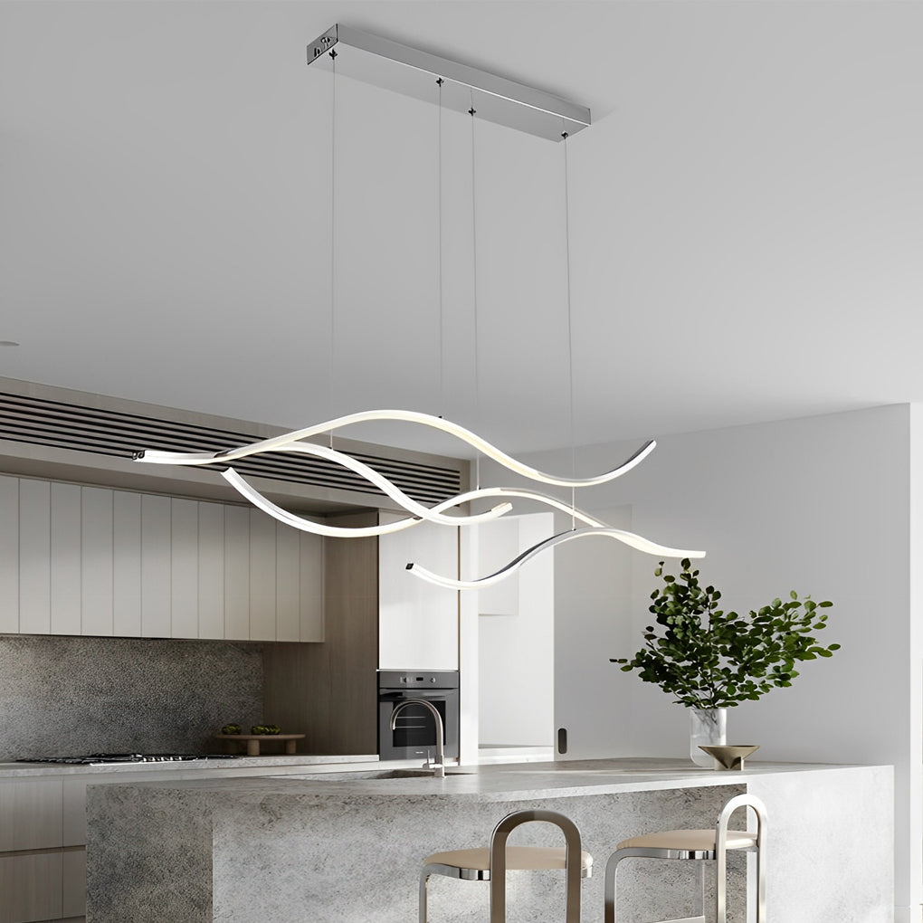Minimal curved LED pendant light suspended in a modern kitchen with clean lines.