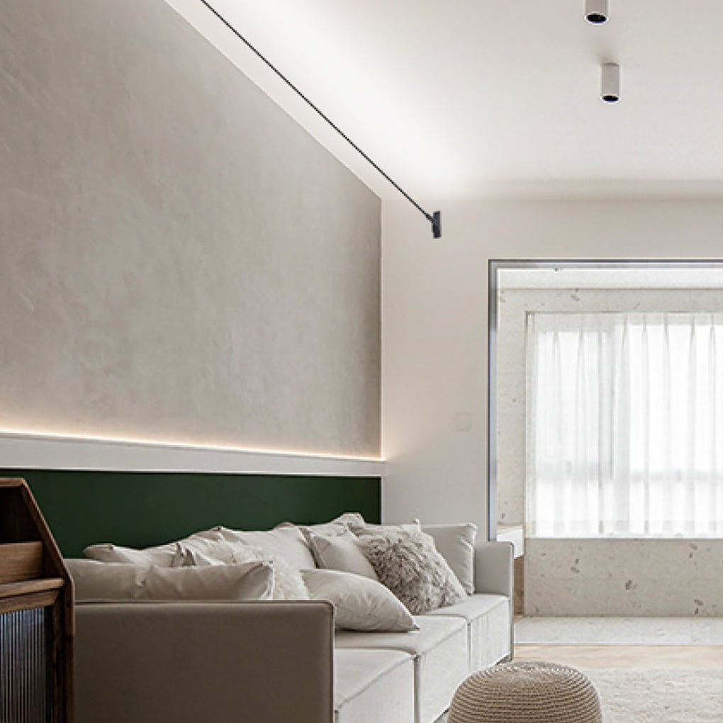 Minimalist led lights strips for room illuminating the ceiling above a cozy beige living room ok