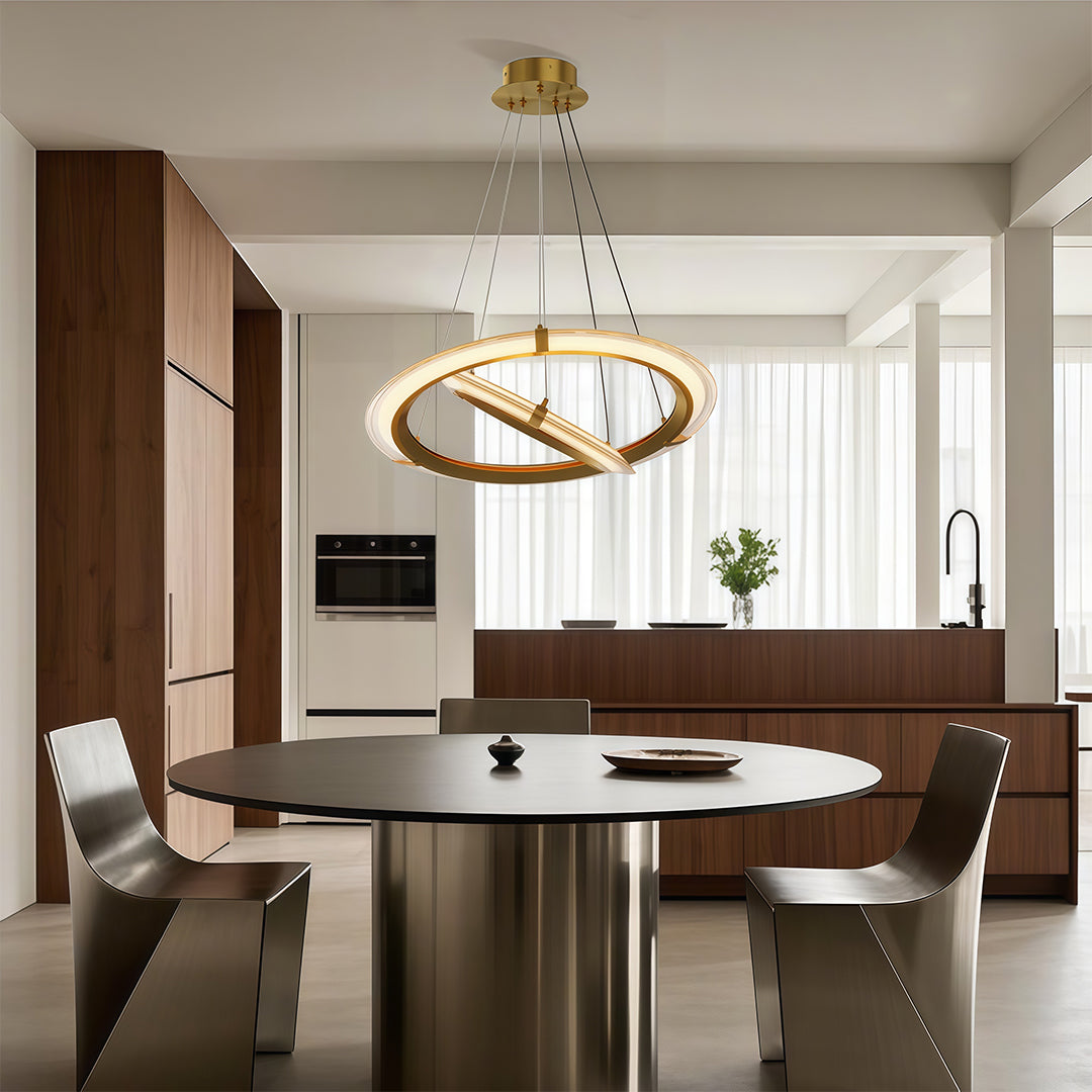 Minimalist modern round chandelier with dual circular rings, hanging in a modern interior.