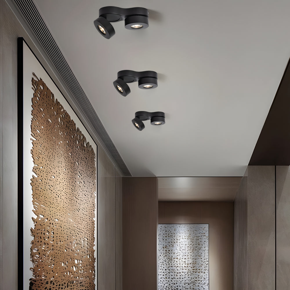 Clean and minimalist surface mount LED downlight in white, perfect for focused and ambient lighting in contemporary rooms.