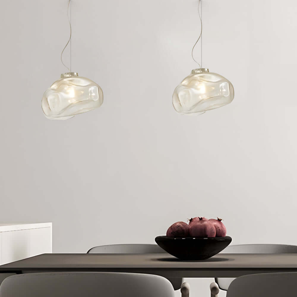 This Transparent Glass Pendant Light combines Nordic simplicity with artisanal hand-blown texture, creating a stylish centerpiece that elevates modern home décor.