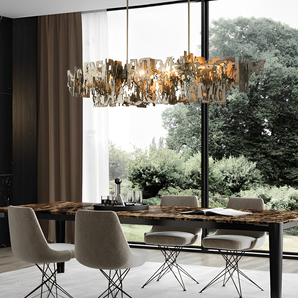 Modern art deco chandelier with a close-up of its abstract gold and crystal structure.