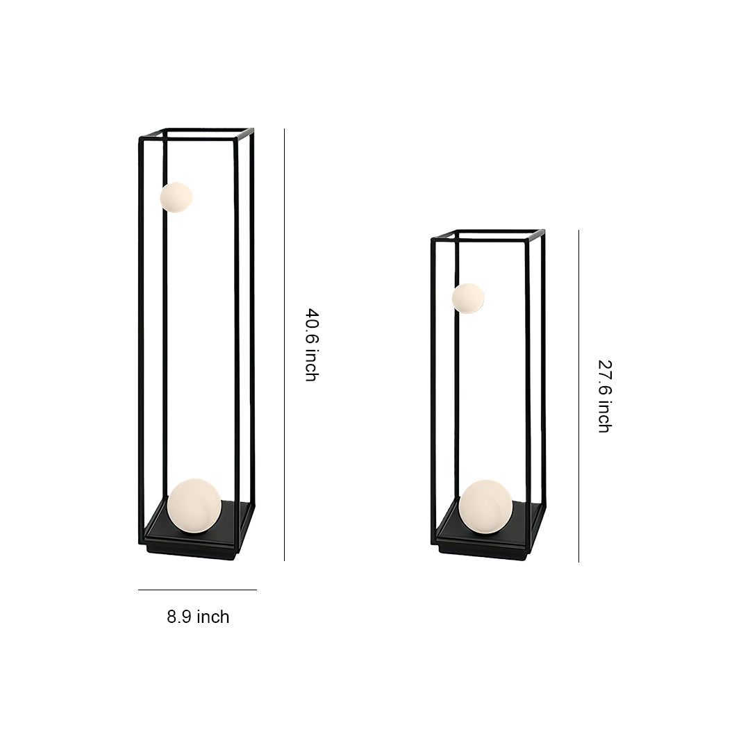 Modern bollard outdoor lighting featuring a geometric black frame with soft, spherical illumination for pathways.