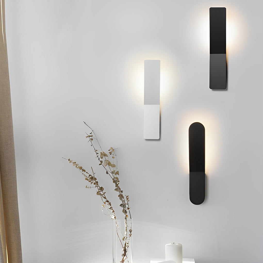 Modern glass pendant chandelier in black, front view of the curved design.