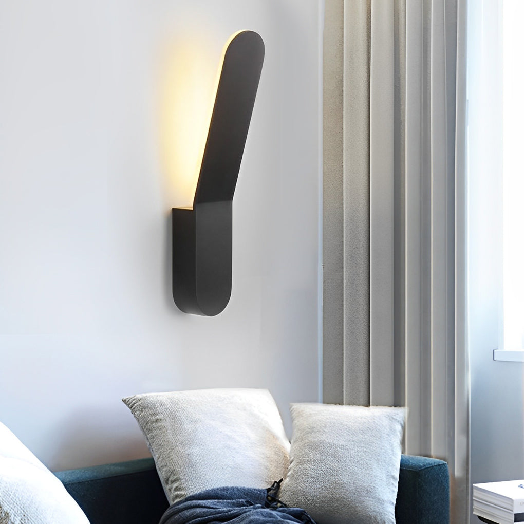 Modern glass pendant chandelier enhancing a minimalist interior with soft glow.