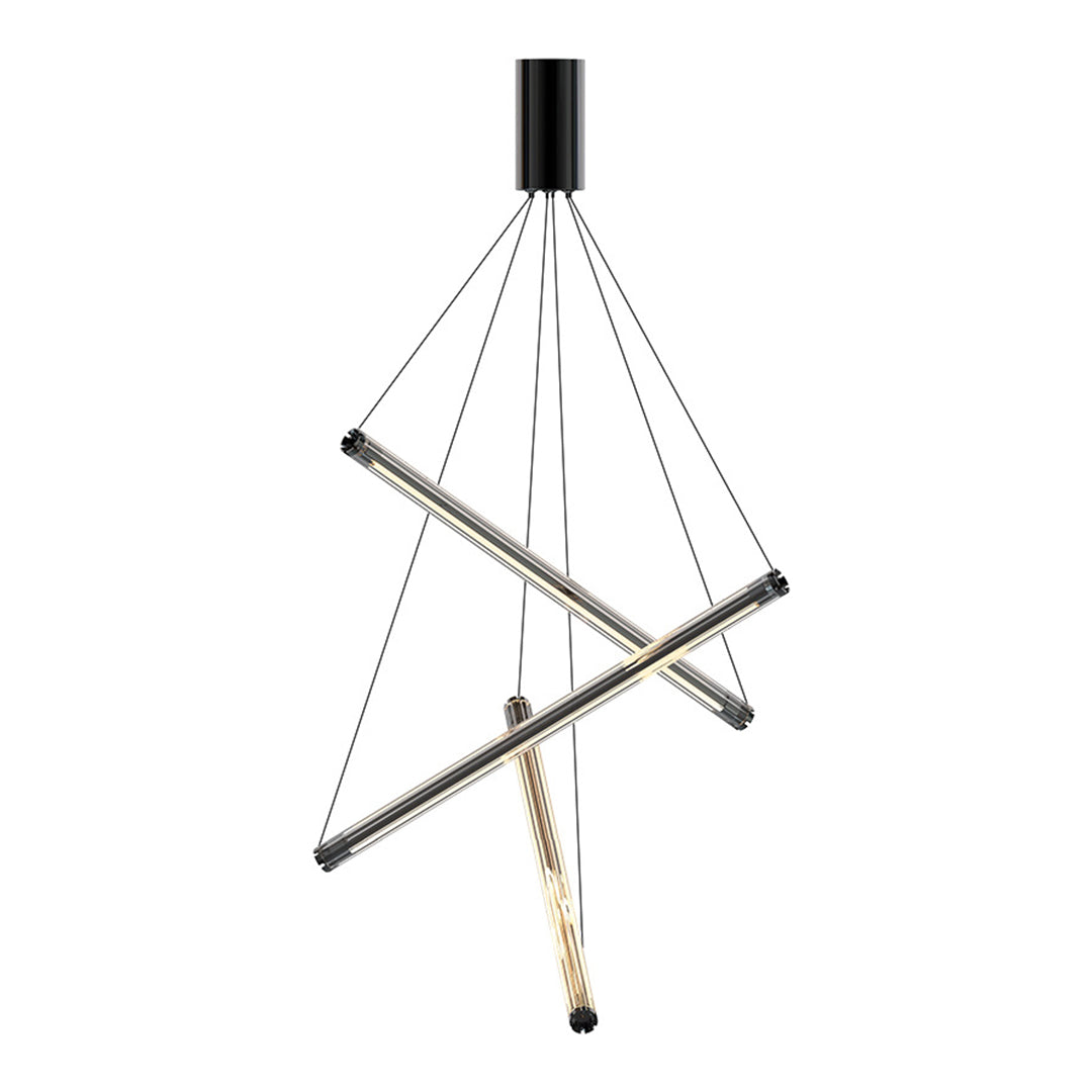 Modern LED linear chandelier with gold bars and cables, suspended in a hallway with white walls and wooden door.