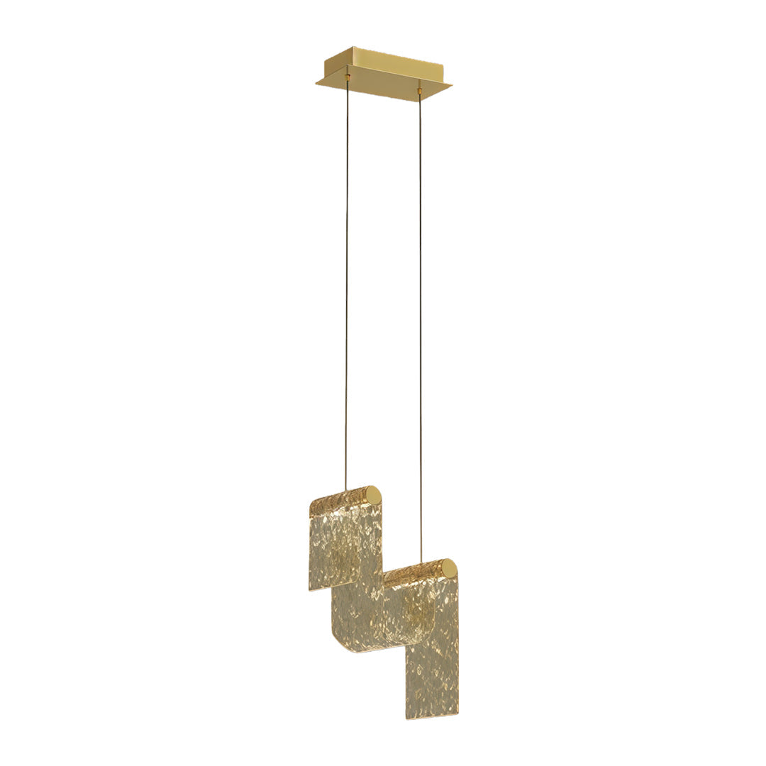 Modern gold pendant island light featuring three textured metal cubes suspended from linear canopy